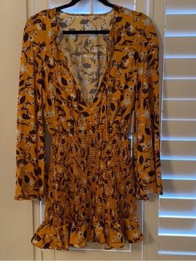 Tularosa Mustard Floral Long Sleeve Smocked Mini Dress